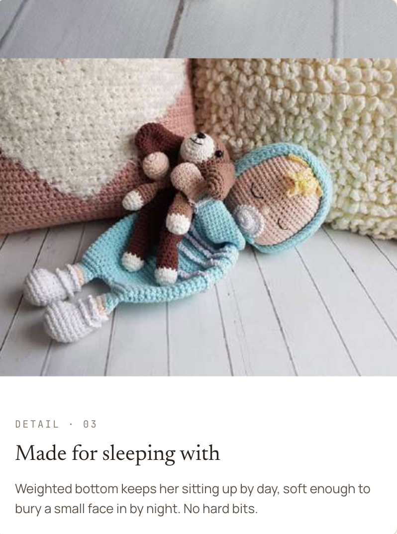 Images of the finished crochet of baby holding a puppy by CMH Goods