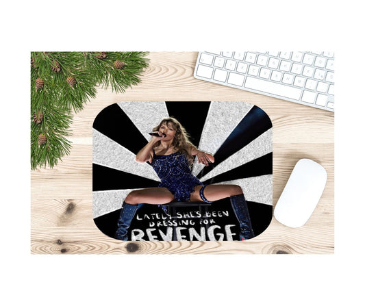 Mouse pad with a design of a person and text on a wooden desk with a keyboard and mouse.